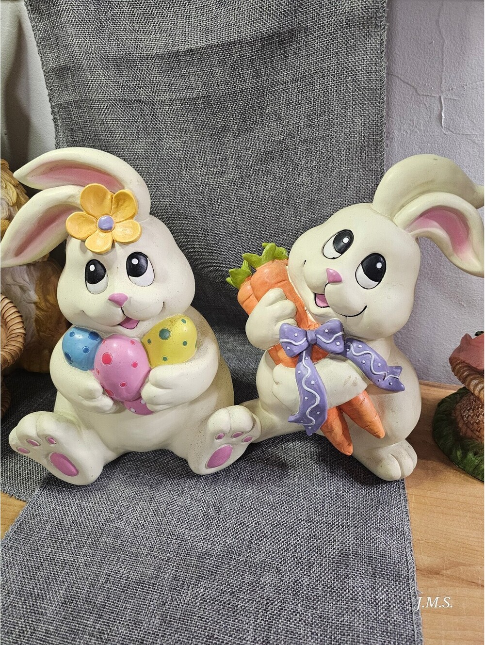 Set of Two Ceramic Easter Bunny Figurines with Colorful Eggs and Carrots